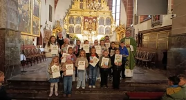 Zdjęcie dotyczy: Święty Michał oczami dzieci – kreatywność nagrodzona po Mszy Świętej